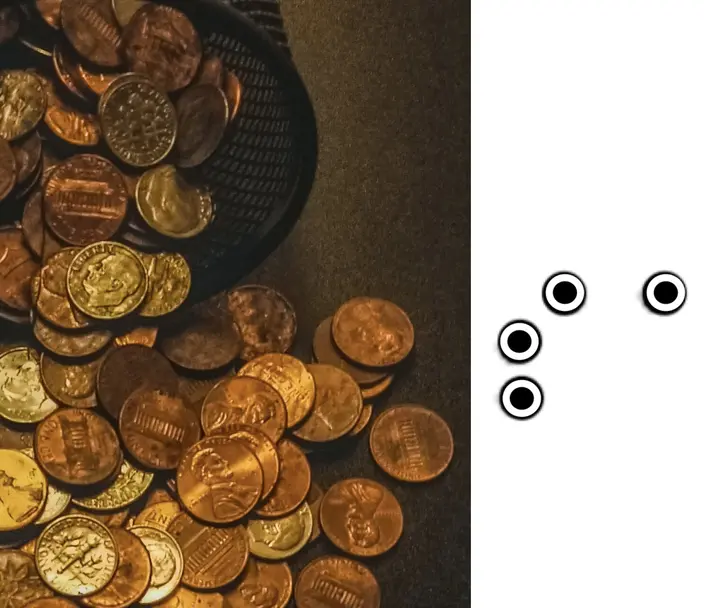 Coins of many denominations spread out and the name Sam in Braille