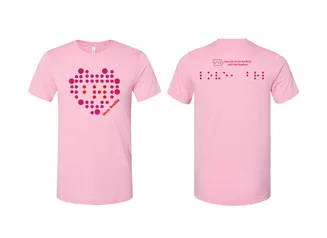 Front and back of pink t-shirts with braille dots that spell the work "braille" in a heart pattern